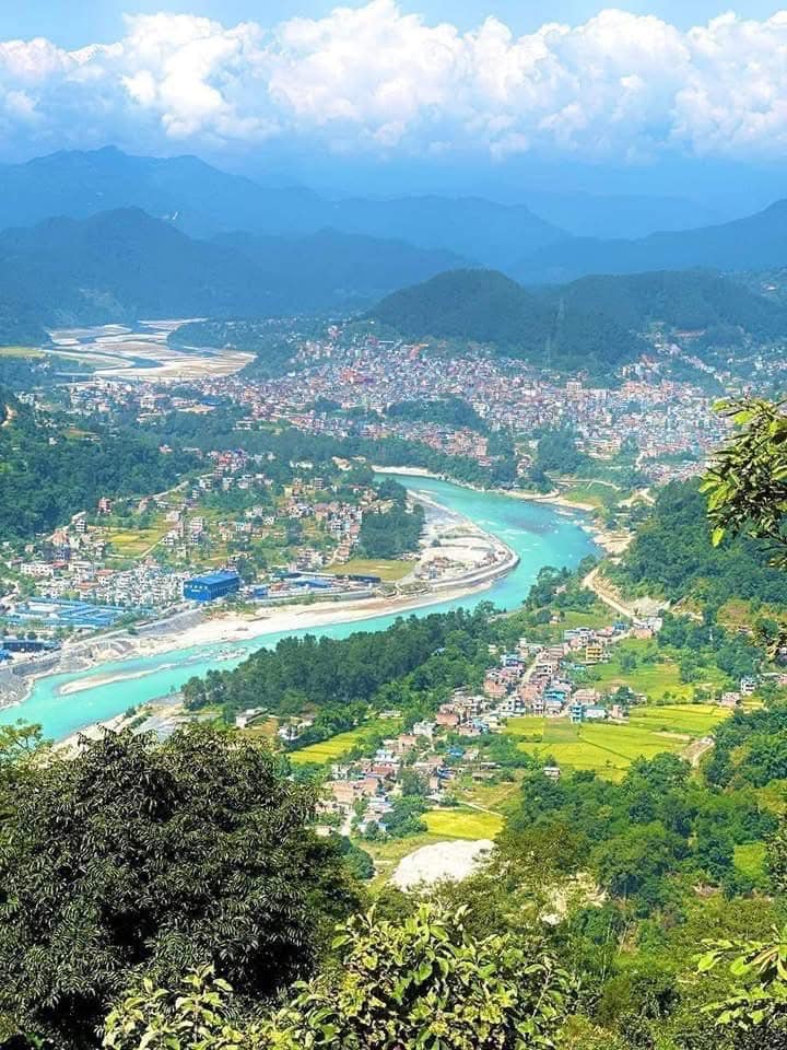 Scenic Beauty of Damauli Village with a Blue River