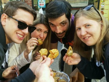 Tourists in Nepal eating Momo