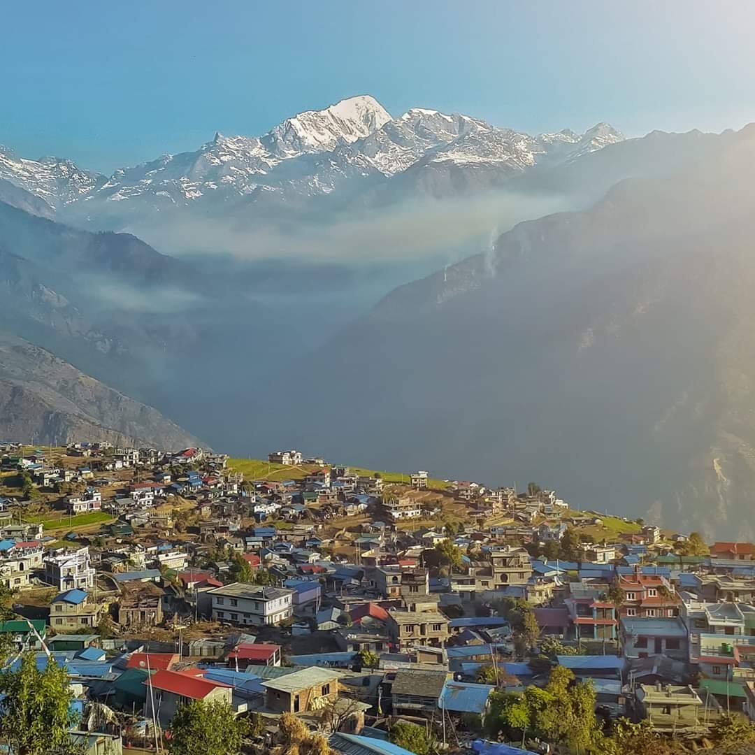 Charming Village Surrounded by Rolling Hills and Himalayan