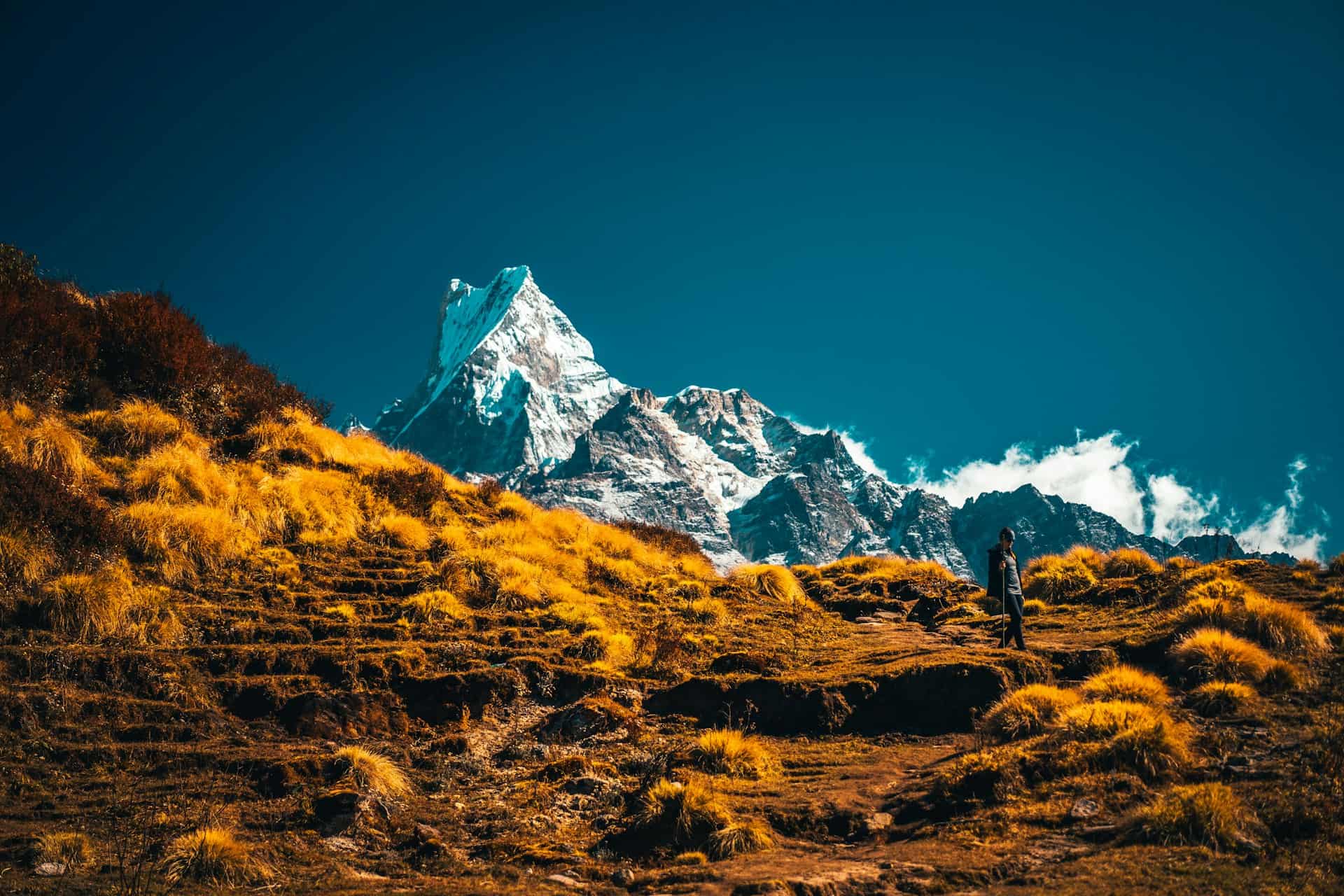 Mountain Peak behind golden brownish smaller mountain