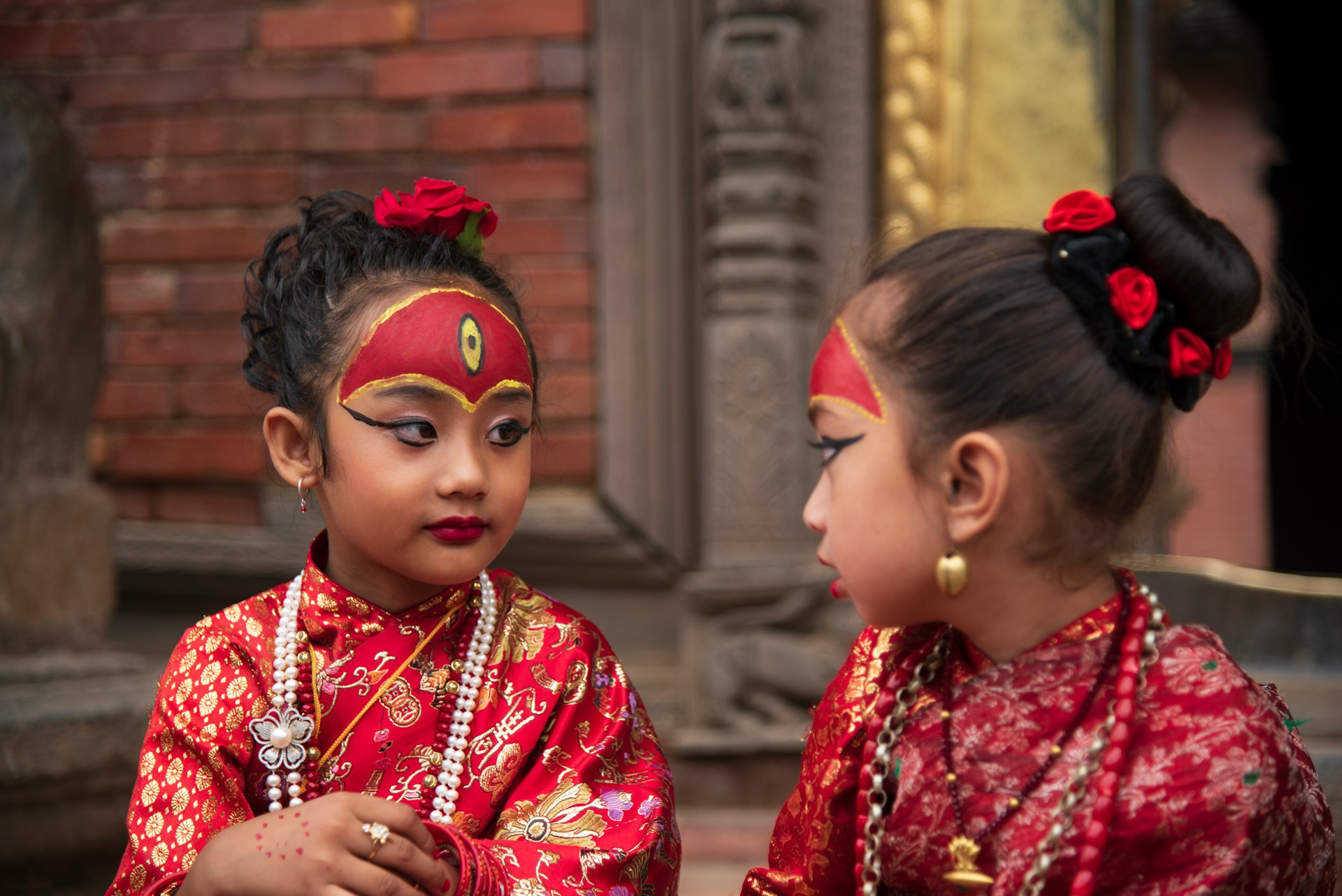 Young Girls Dressed as Kumari in Traditional Attire