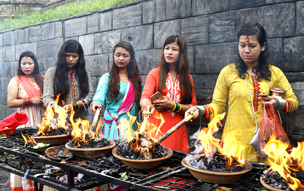 Women Performing Puja in Shrawan